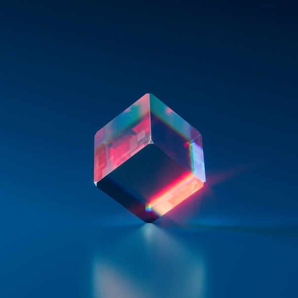 A glass cube resting on its vertex in an equilibrium position